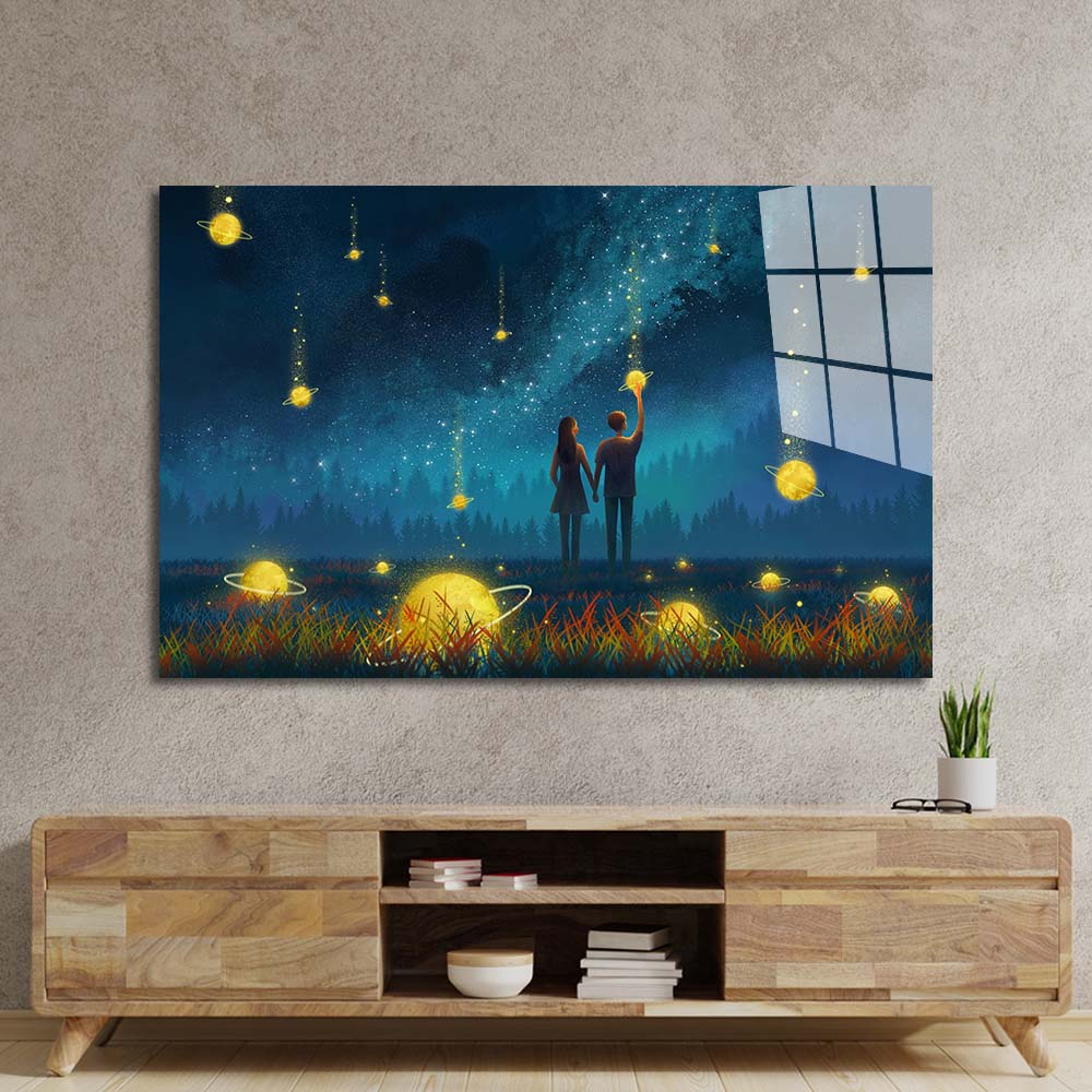 Couple Under Falling Planets Glass Wall Art